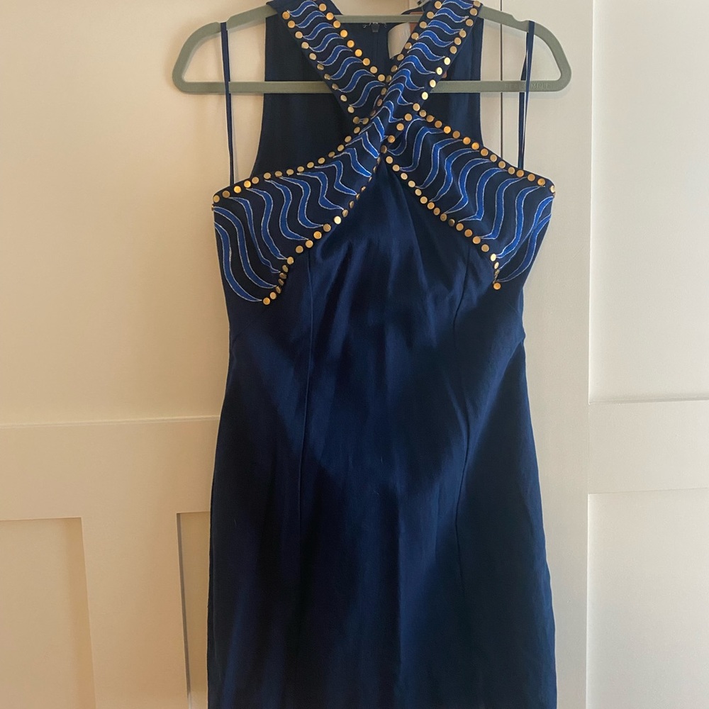 Cross neck navy mini dress with gold stud details size M. New with tags